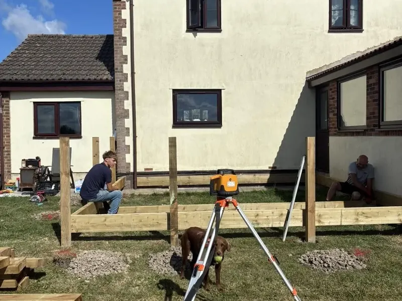 Levelling the posts and frame of a raised deck with a laser level on a tripod